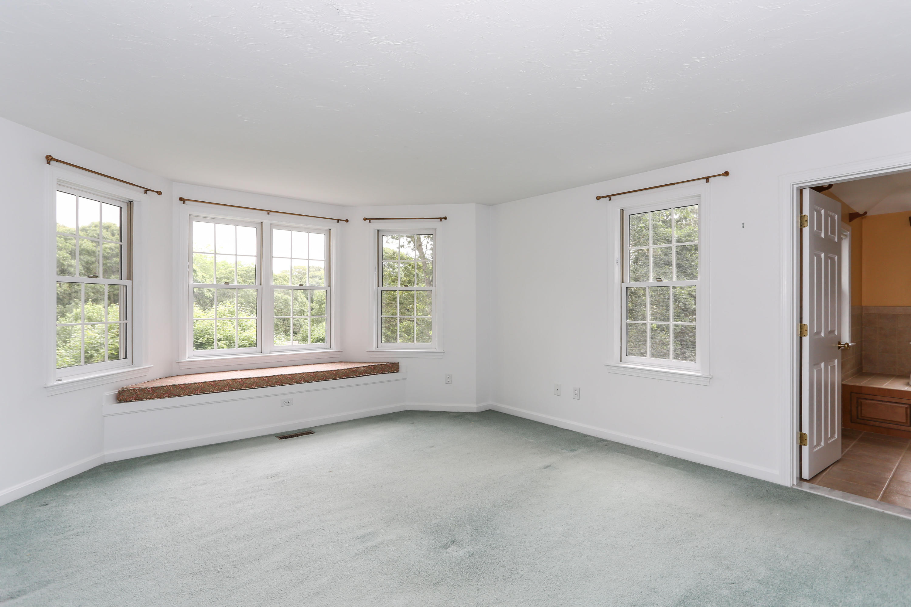 65 Trinity Place Centerville, MA 02632 - Photo 24 of 34 an empty room with windows
