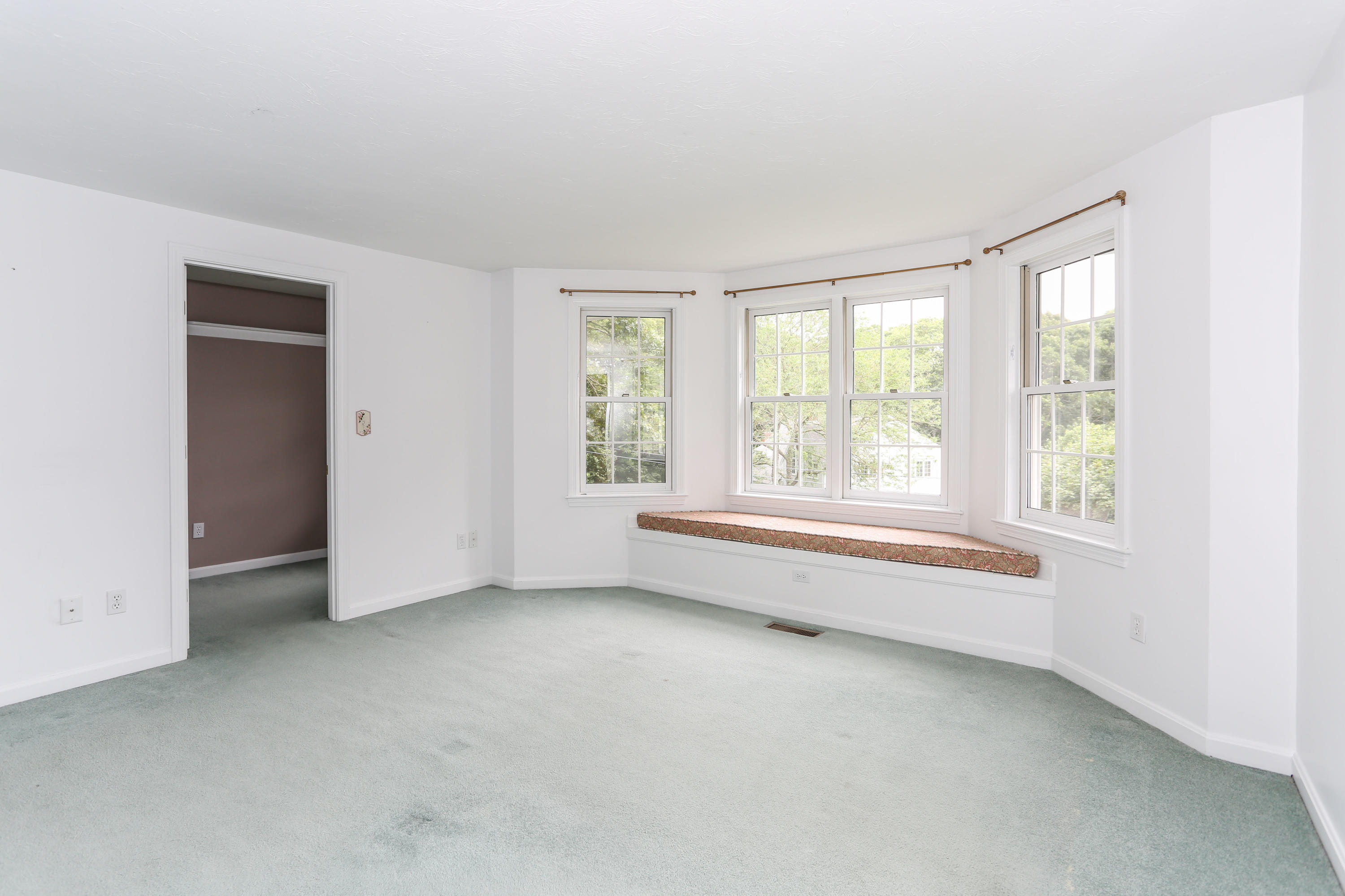 65 Trinity Place Centerville, MA 02632 - Photo 25 of 34 a view of an empty room with a window