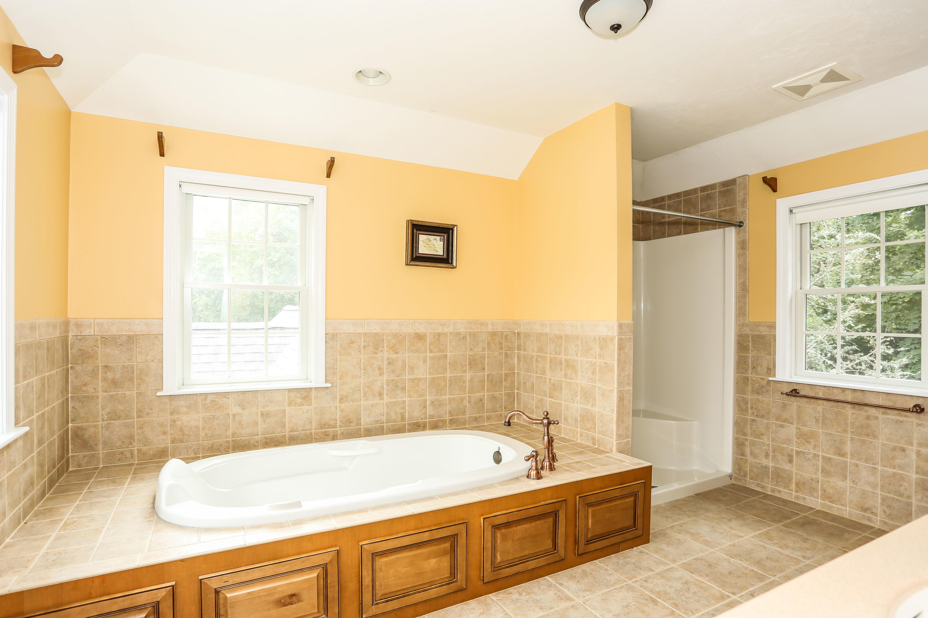 65 Trinity Place Centerville, MA 02632 - Photo 27 of 34 a spacious bathroom with sink shower and bathtub