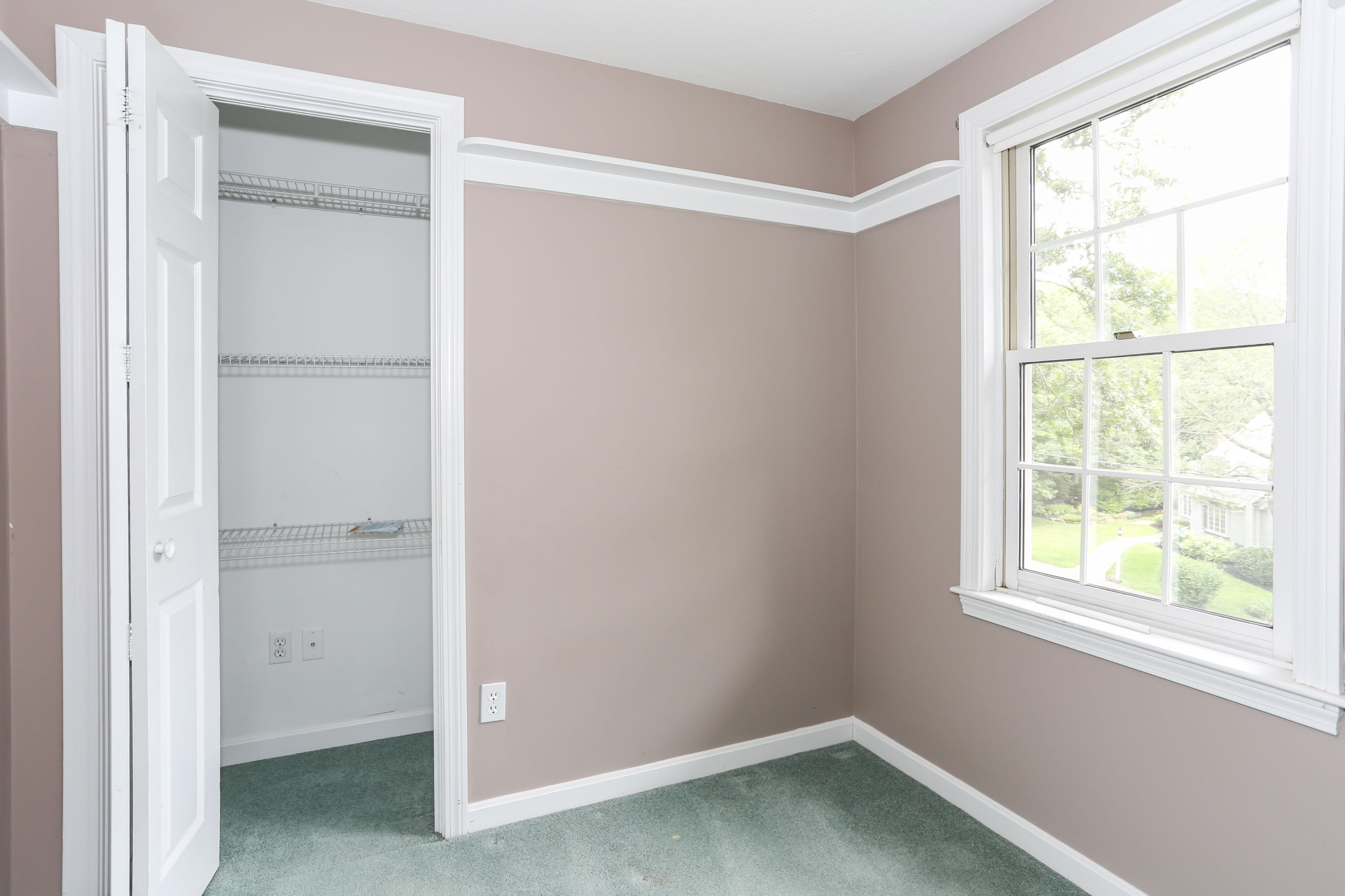 65 Trinity Place Centerville, MA 02632 - Photo 29 of 34 a view of an empty room with a window