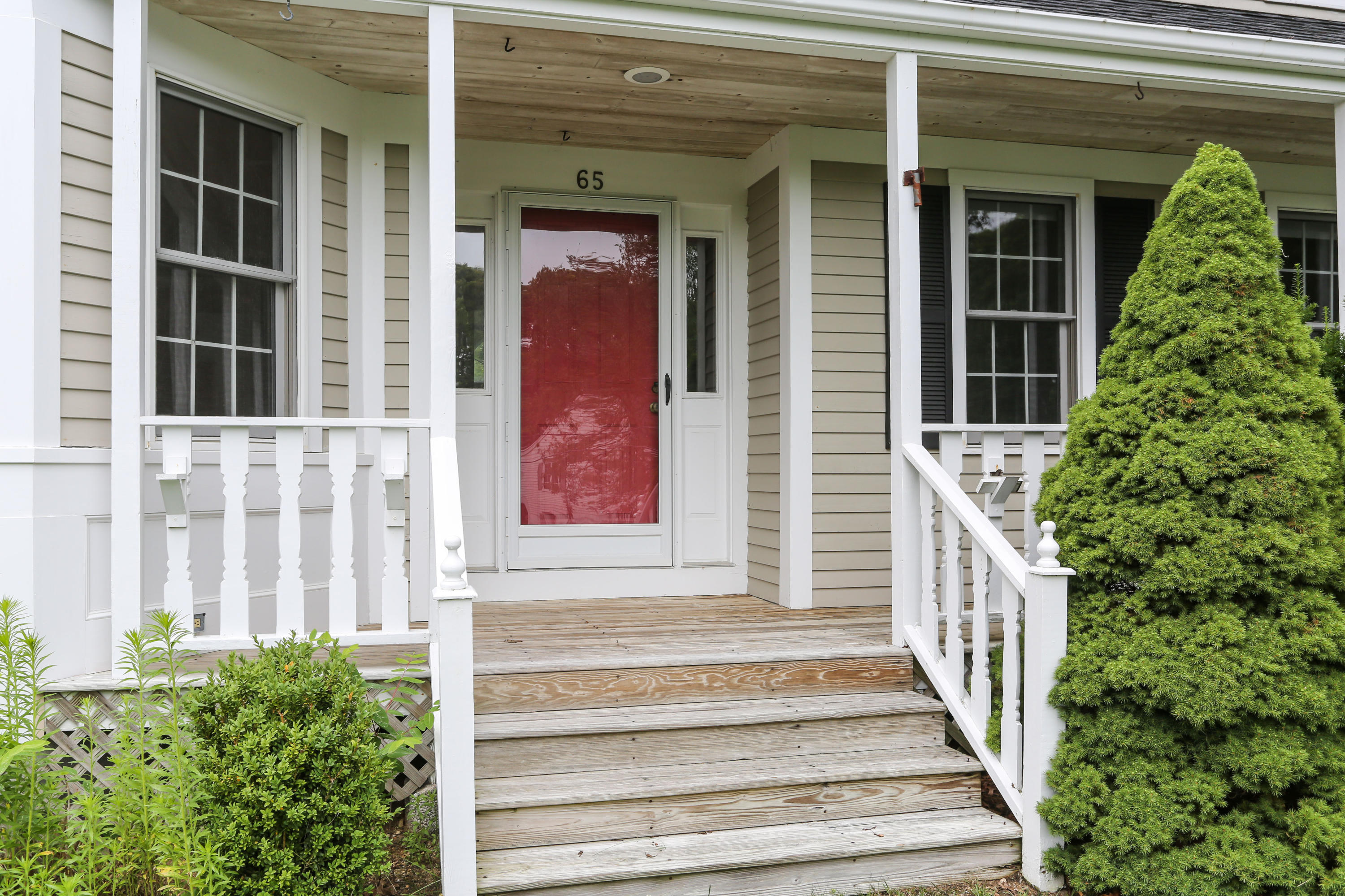 65 Trinity Place Centerville, MA 02632 - Photo 4 of 34 a view of a house with windows