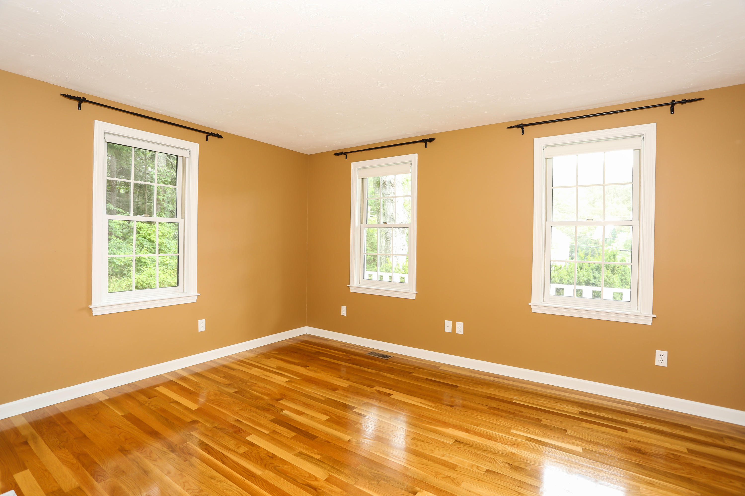65 Trinity Place Centerville, MA 02632 - Photo 8 of 34 a view of an empty room with a window