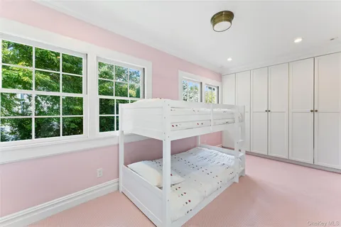 a room with a bed and a window