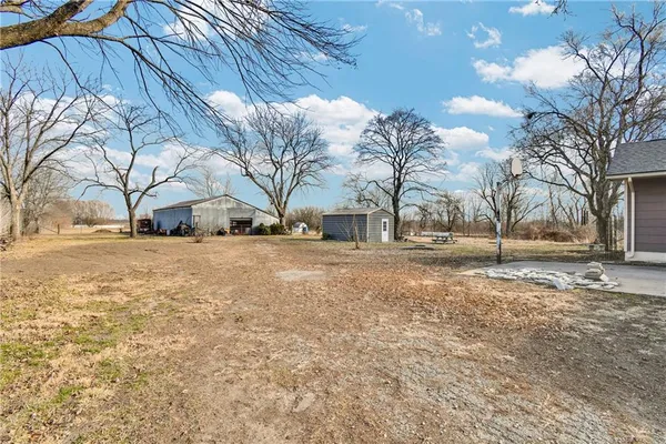 $415,000 | 24511 South State Route, East Lynne, MO 64743