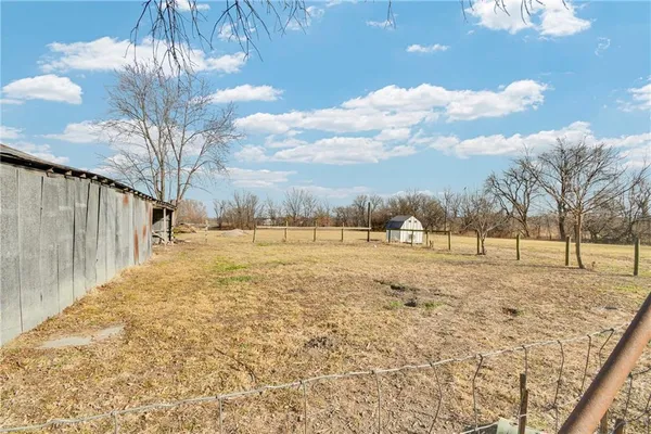 $415,000 | 24511 South State Route, East Lynne, MO 64743
