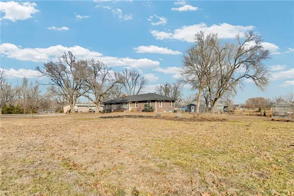 $415,000 | 24511 South State Route, East Lynne, MO 64743