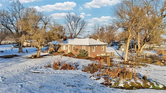 $425,000 | 24511 South State Route, East Lynne, MO 64743