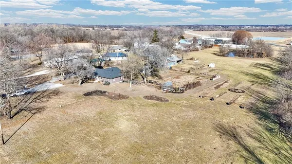 $415,000 | 24511 South State Route, East Lynne, MO 64743