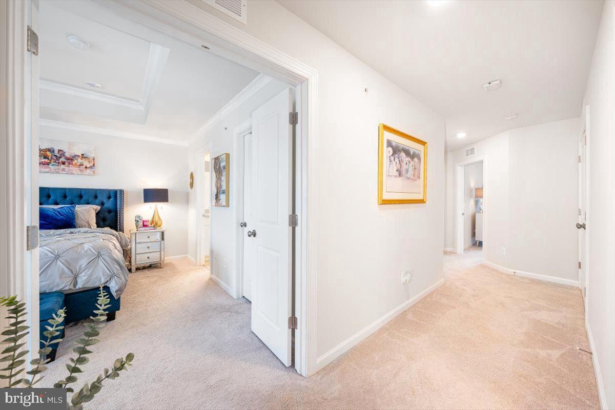 5950 Forum Square Frederick, MD 21703 - Photo 13 of 39 Wide upper level hallway