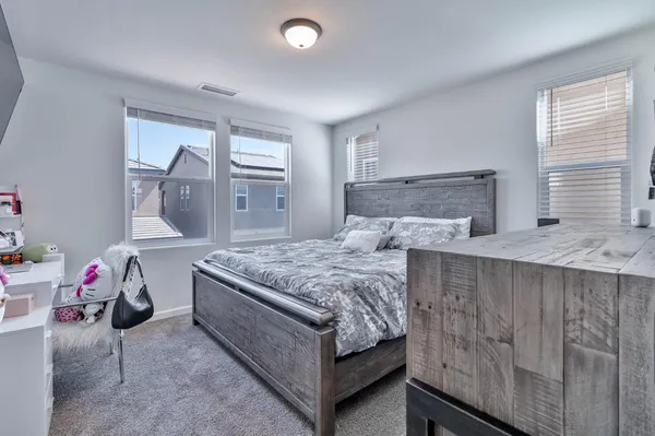 a bathroom with a sink double vanity and a mirror