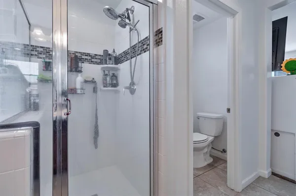 a bedroom with a bed and dresser