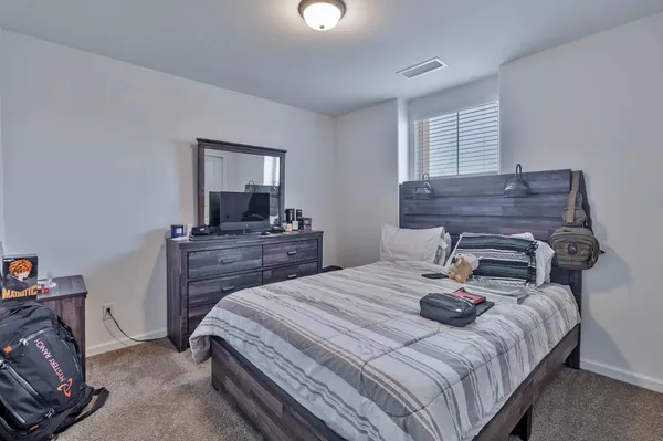 a room with furniture and a window