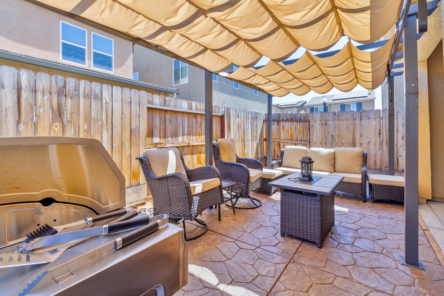 915 Winchell Way West Madera, CA 93636 - Photo 40 of 42 a roof deck with table and chairs