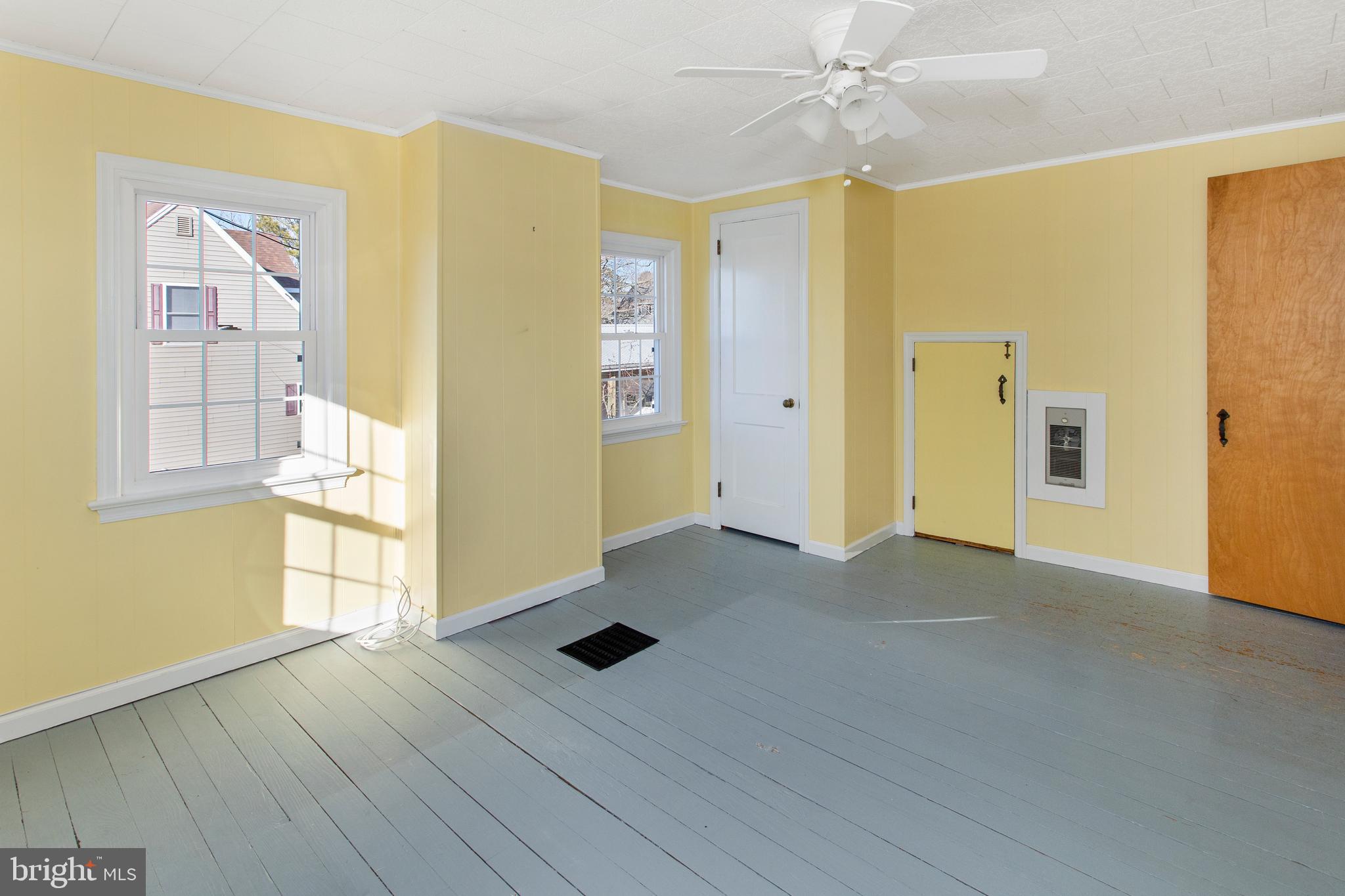 4701 Tyaskin Road Tyaskin, MD 21865 - Photo 18 of 30 a view of an empty room with window and wooden floor