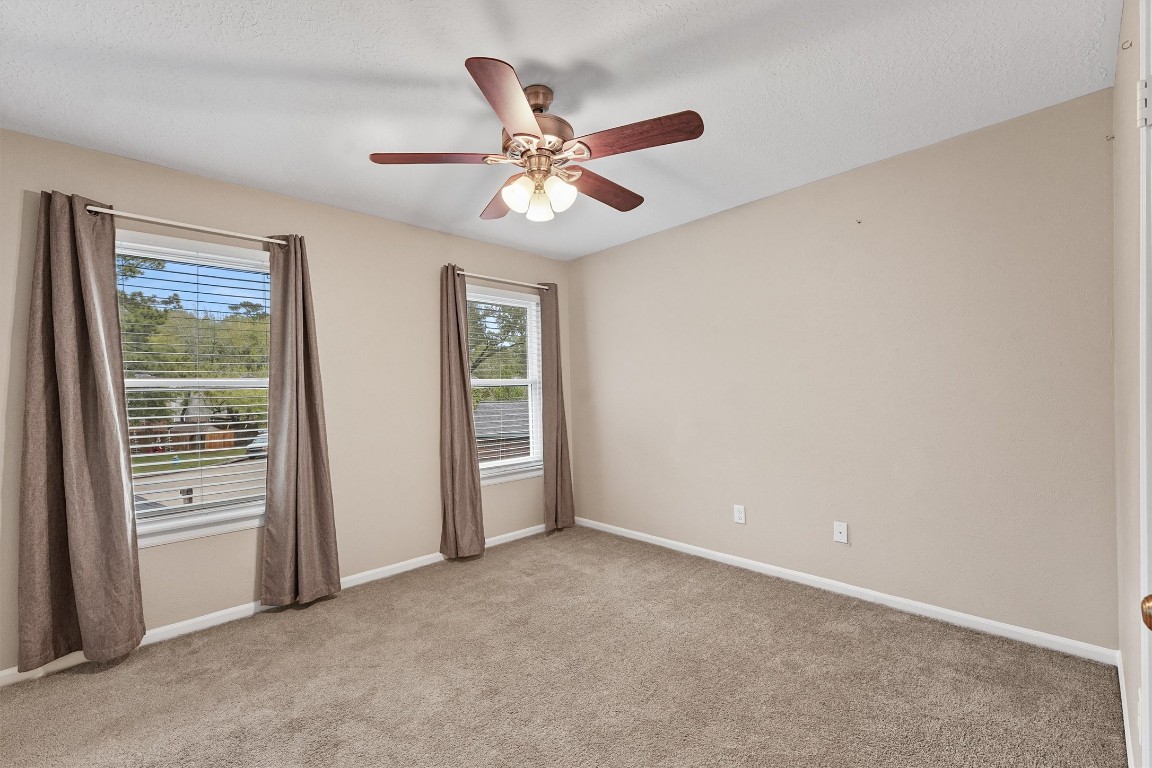 3702 Ember Spring Drive Houston, TX 77339 - Photo 18 of 27 a view of an empty room with a window