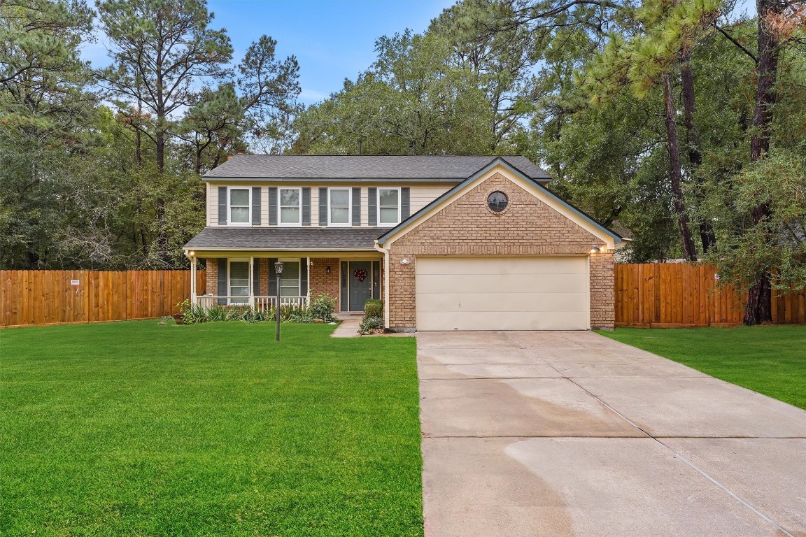 3702 Ember Spring Drive Houston, TX 77339 - Photo 5 of 27 a front view of a house with a yard