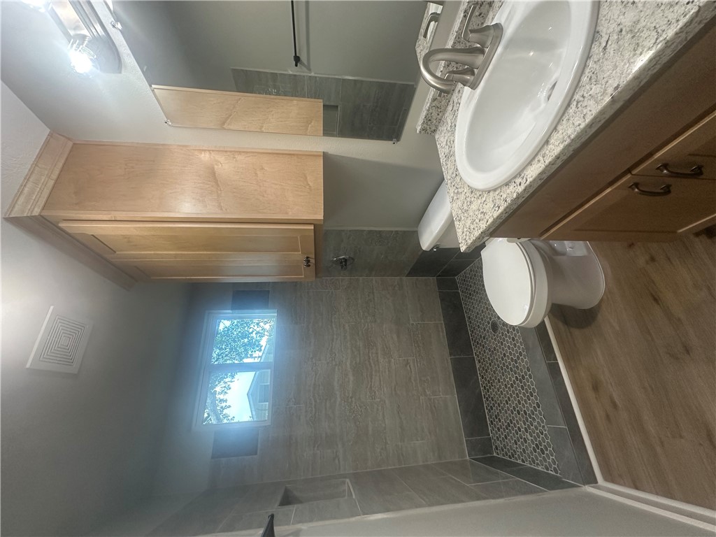 2107 Woodville Road Bryan, TX 77803 - Photo 7 of 12 hall bathroom