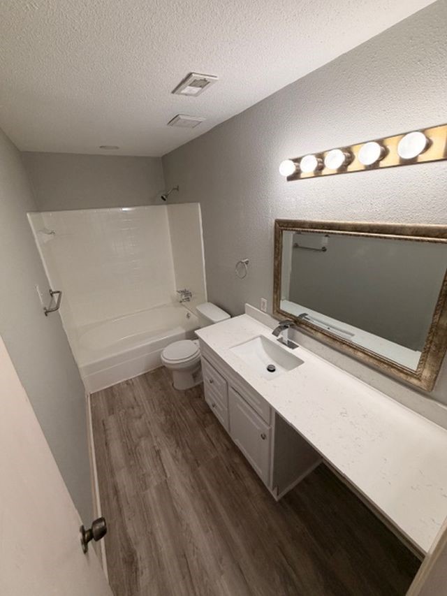 2955 Shadow Trail Drive Houston, TX 77082 - Photo 18 of 19 a bathroom with a sink and mirror