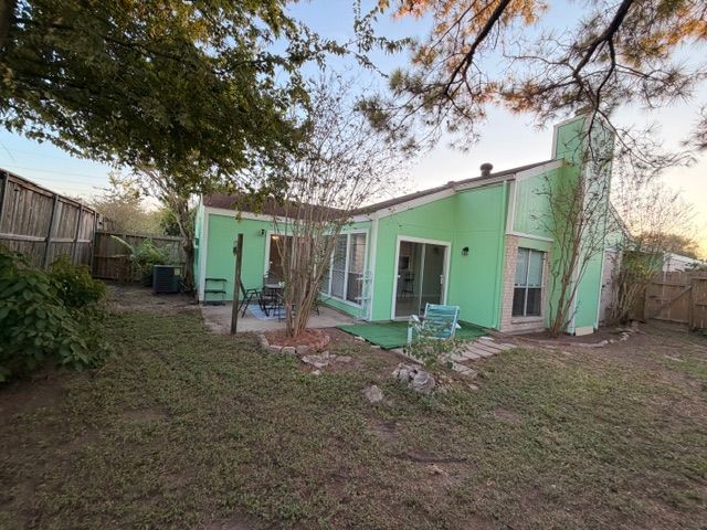 2955 Shadow Trail Drive Houston, TX 77082 - Photo 4 of 19 a view of a house with a backyard