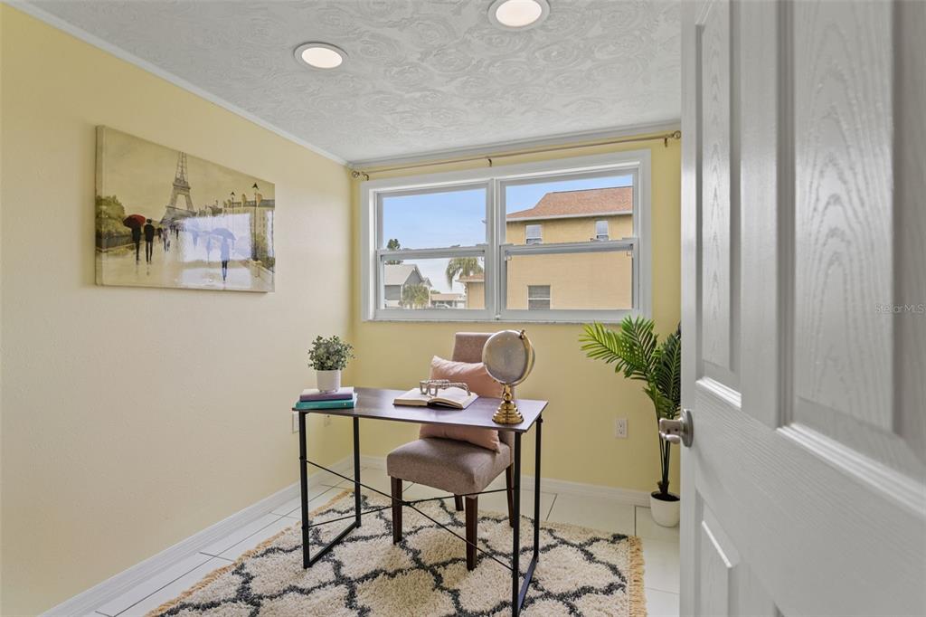 7401 Islander Lane Hudson, FL 34667 - Photo 16 of 30 a dining room with furniture and window