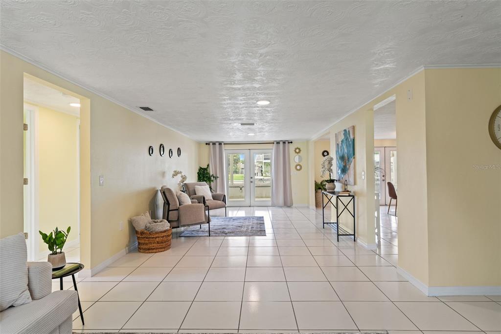 7401 Islander Lane Hudson, FL 34667 - Photo 7 of 30 a living room with furniture and white walls