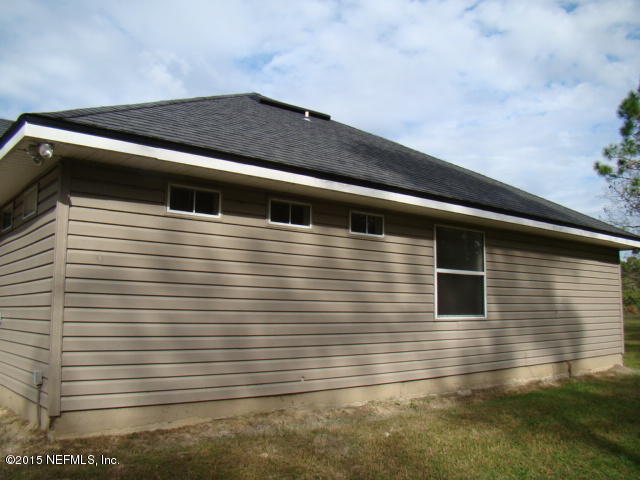 1824 Big Branch Road Middleburg, FL 32068 - Photo 3 of 29 SIDE LEFT