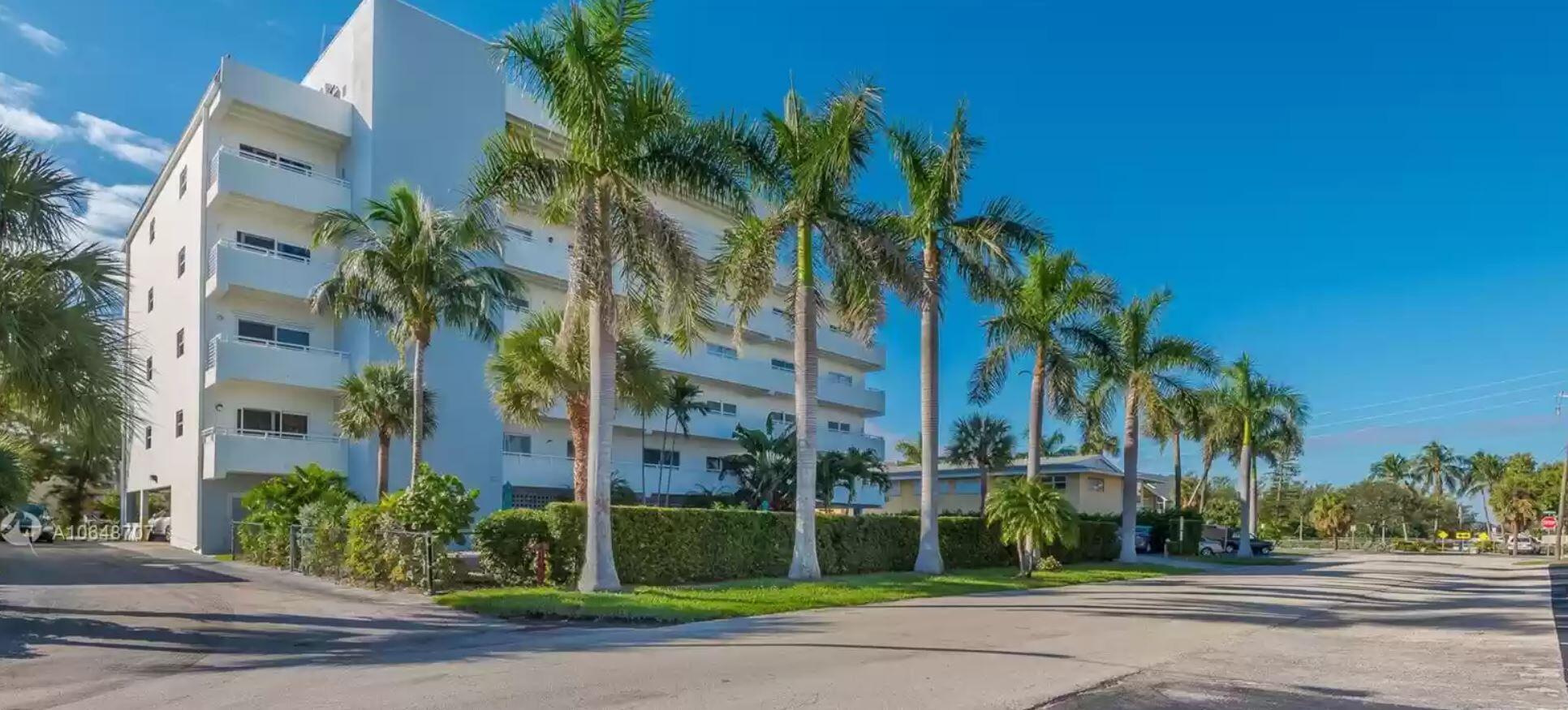3212 Northeast 12th Street, Unit 302 Pompano Beach, FL 33062 - Photo 7 of 25 a view of a palm trees