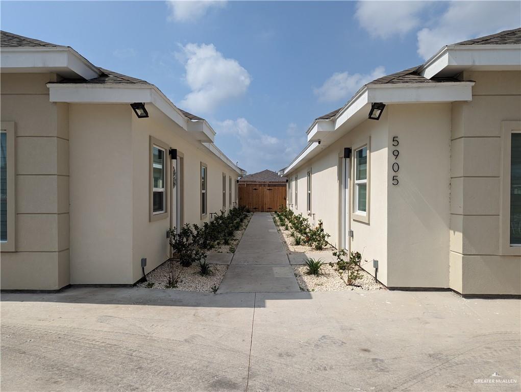 5905 Puffin Avenue, Unit 1 Mission, TX 78573 - Photo 2 of 12 a front view of a house with garden