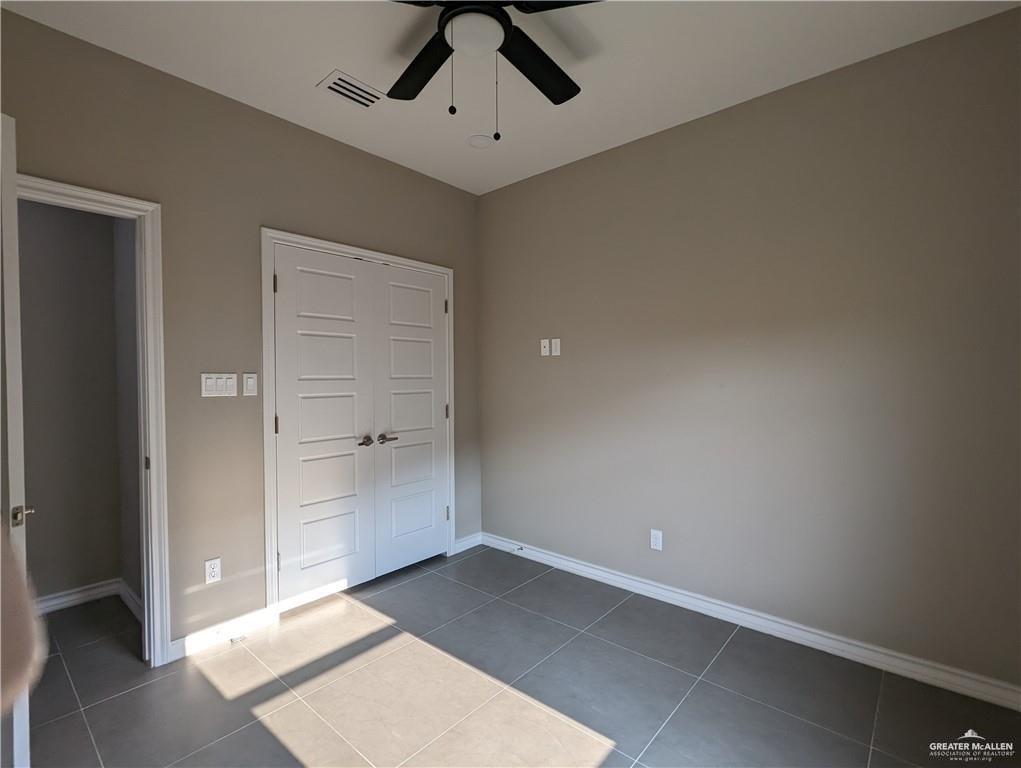 5905 Puffin Avenue, Unit 1 Mission, TX 78573 - Photo 10 of 12 wooden floor in an empty room