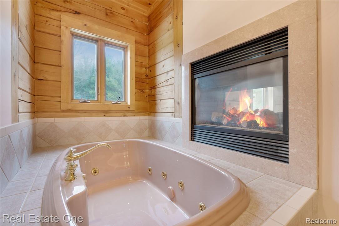 9485 Henderson Road Goodrich, MI 48438 - Photo 21 of 50 DOESN'T GET BETTER THEN A JACUZZI TUB & WARM FIREPLACE