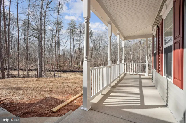 a view of a backyard of the house
