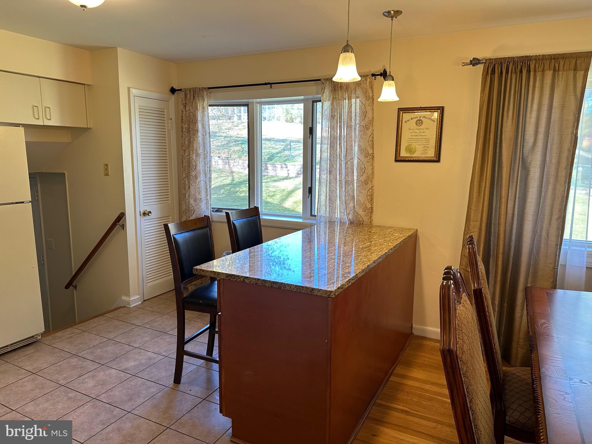 5405 Manorfield Road Rockville, MD 20853 - Photo 12 of 34 Breakfast bar seen from dining room