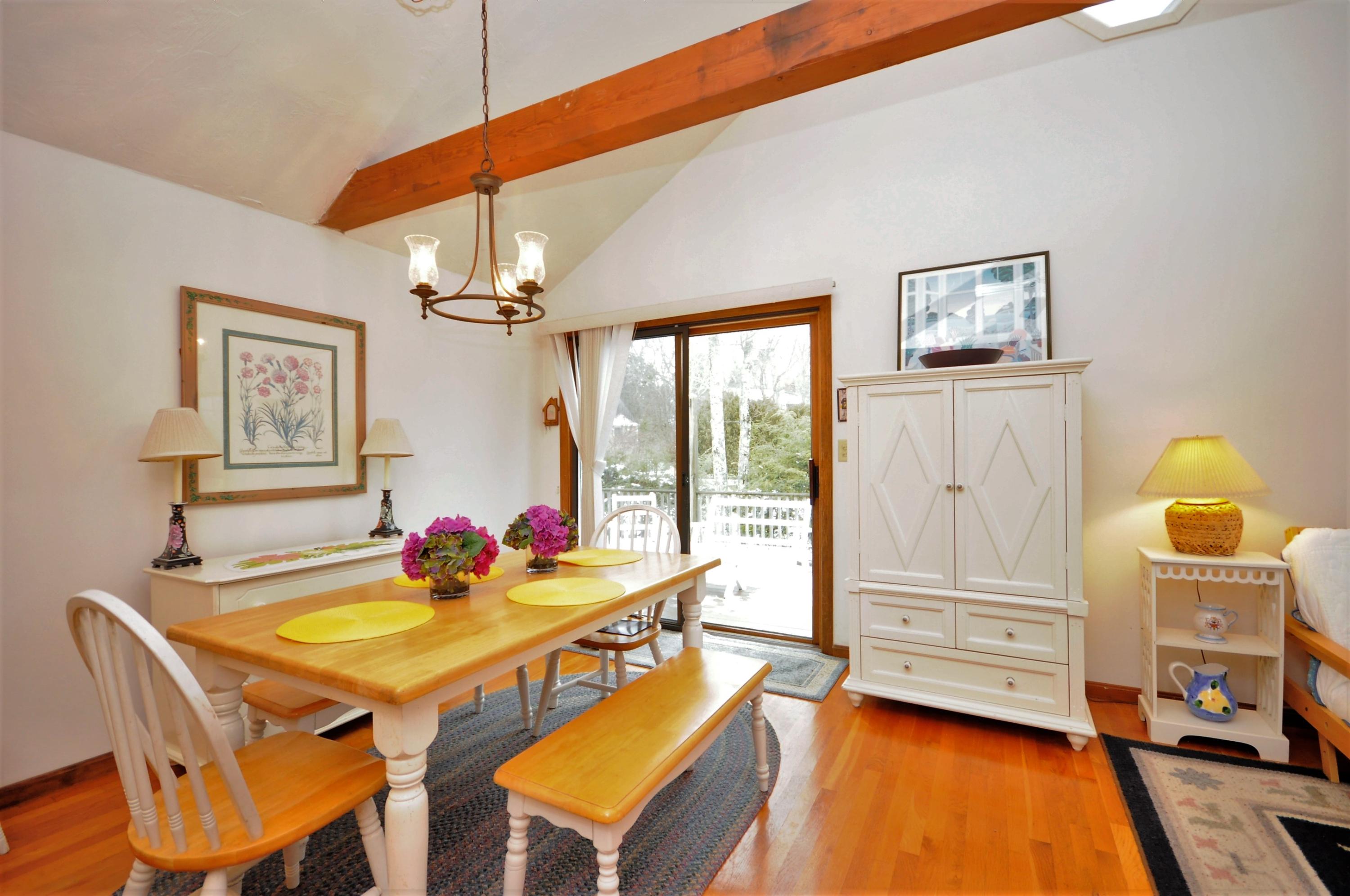 15 McGrath Road Sagamore Beach, MA 02562 - Photo 6 of 24 a dining room with furniture and window