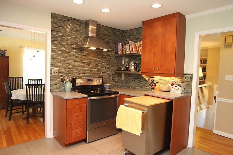 905 Tyrrell Road Raleigh, NC 27609 - Photo 6 of 13 The other side! Gorgeous mosaic tile bkspl, Open shelving, Pull out Island. Awesome! Kitchen