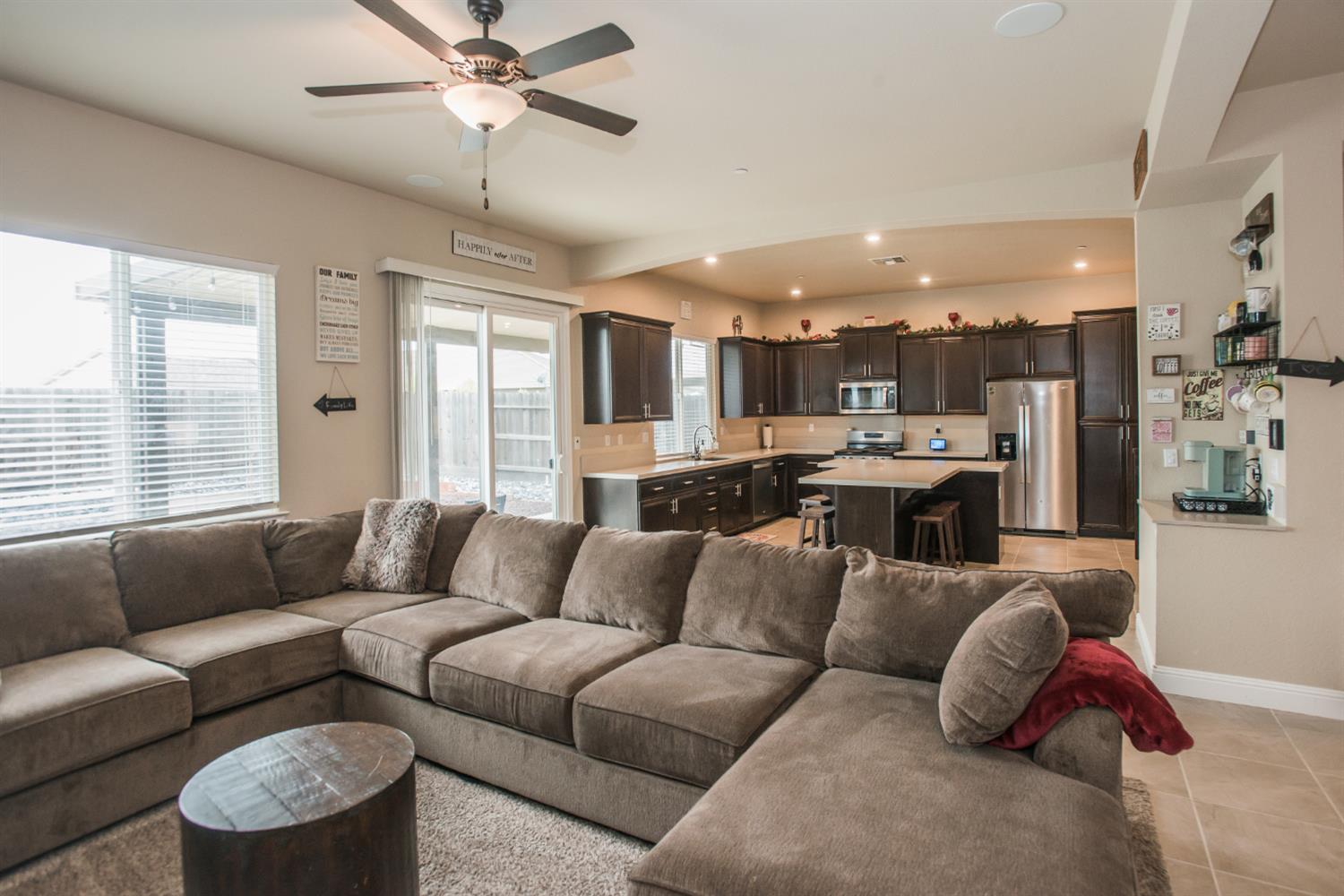 1082 Marichal Way Galt, CA 95632 - Photo 11 of 45 a living room with furniture and a large window