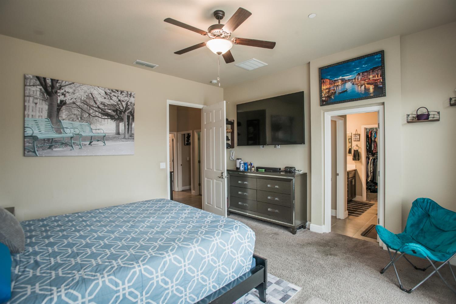 1082 Marichal Way Galt, CA 95632 - Photo 27 of 45 a bedroom with a bed and a flat screen tv