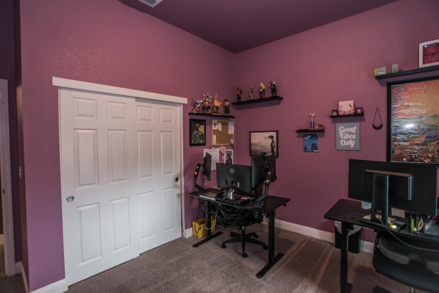 1082 Marichal Way Galt, CA 95632 - Photo 36 of 45 a view of a workspace with furniture and a refrigerator