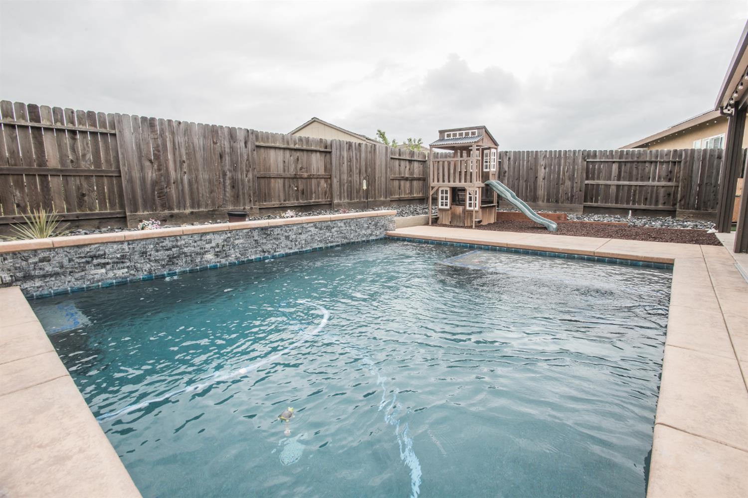 1082 Marichal Way Galt, CA 95632 - Photo 44 of 45 a view of a water pond with a fountain