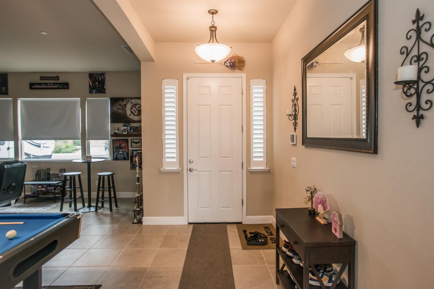 1082 Marichal Way Galt, CA 95632 - Photo 5 of 45 a room with furniture and a chandelier