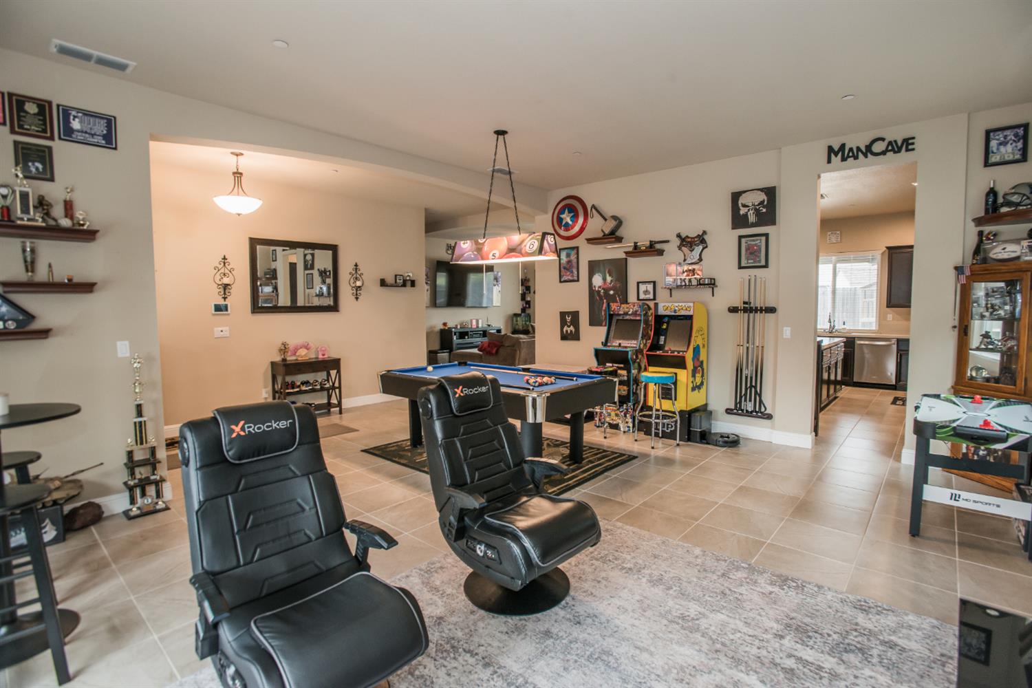 1082 Marichal Way Galt, CA 95632 - Photo 8 of 45 a view of a livingroom with furniture and a flat screen tv