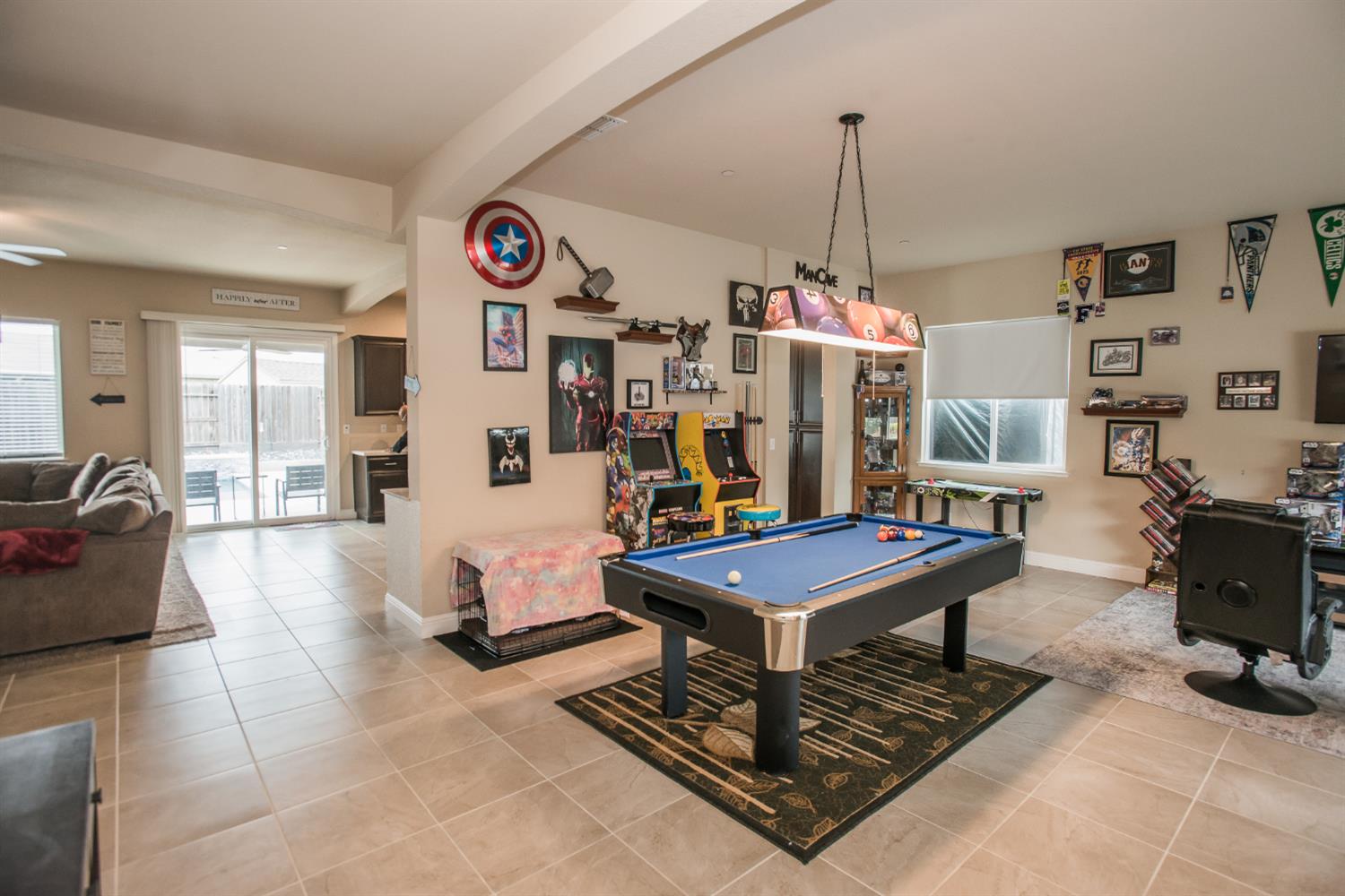 1082 Marichal Way Galt, CA 95632 - Photo 9 of 45 a living room with furniture a rug and gym equipment