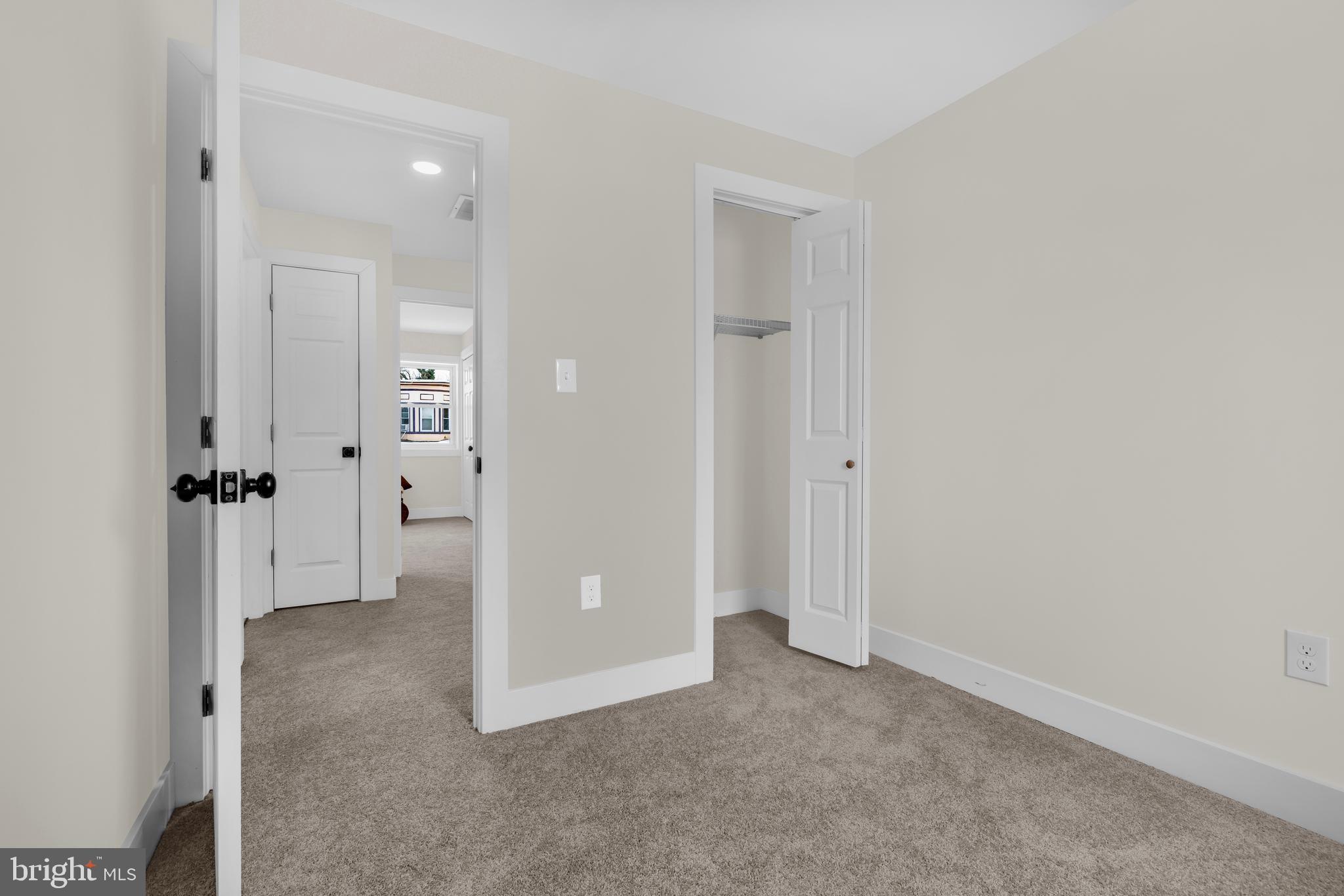 3827 Cottage Avenue Baltimore, MD 21215 - Photo 19 of 43 an empty room with windows