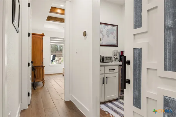 a kitchen with stainless steel appliances a refrigerator and a stove