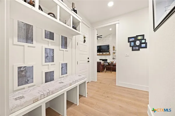 a open kitchen with stainless steel appliances granite countertop a refrigerator and microwave