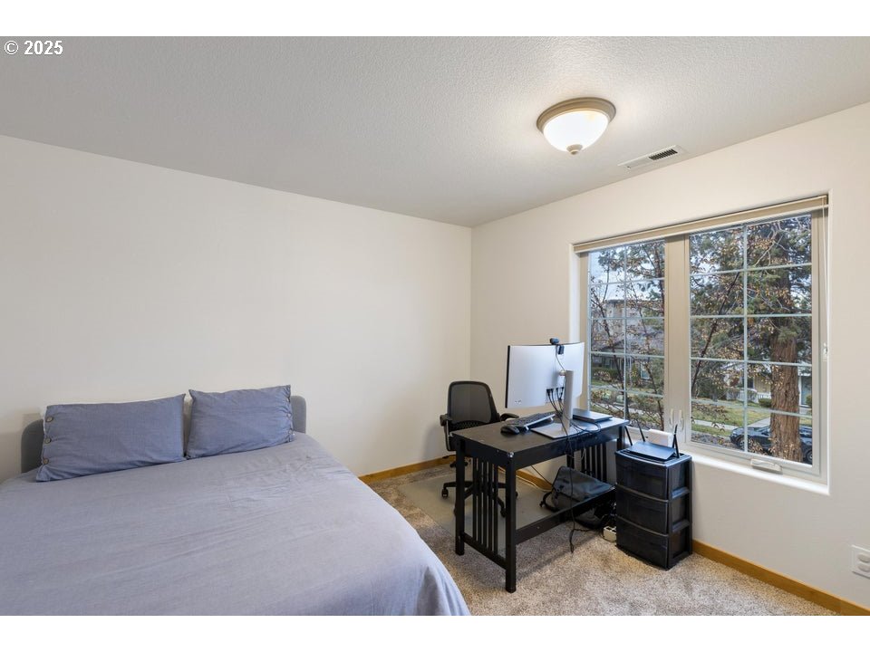 109 Southwest Taft Avenue Bend, OR 97702 - Photo 15 of 23 a living room with furniture and a large window