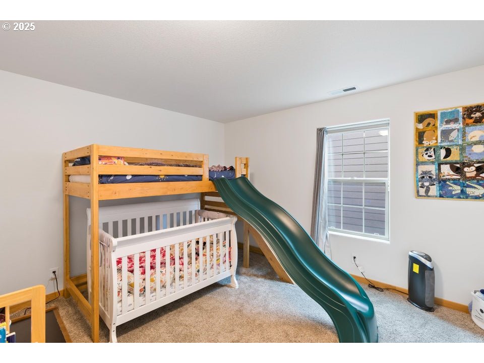 109 Southwest Taft Avenue Bend, OR 97702 - Photo 22 of 23 a view of a stairs and an empty room
