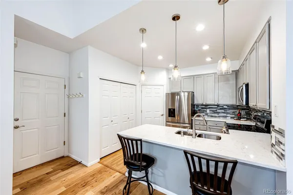 $455,000 | 9521 West Indore Drive, Littleton, CO 80128