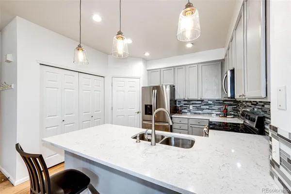 $455,000 | 9521 West Indore Drive, Littleton, CO 80128