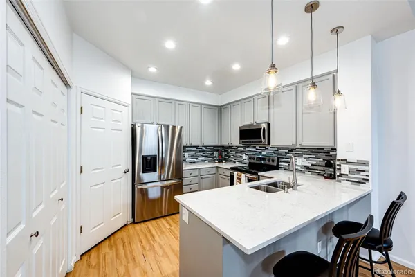 $455,000 | 9521 West Indore Drive, Littleton, CO 80128