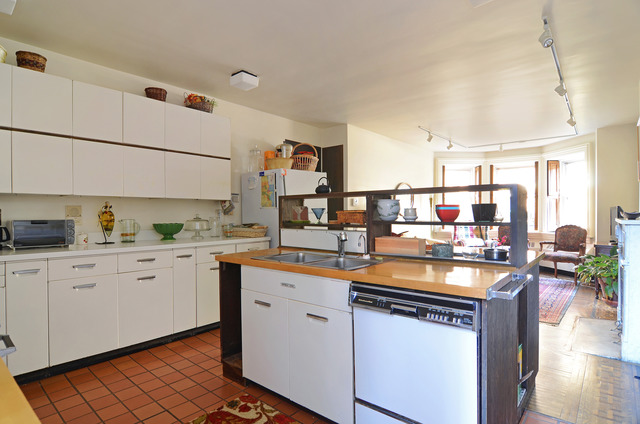 Undisclosed Address Chicago, IL 60610 - Photo 6 of 18 a kitchen with a sink and cabinets